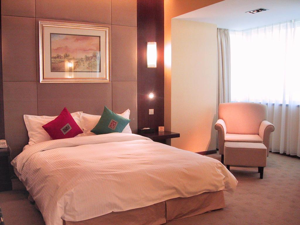 Maxcourt Hotel Changchun Room photo
